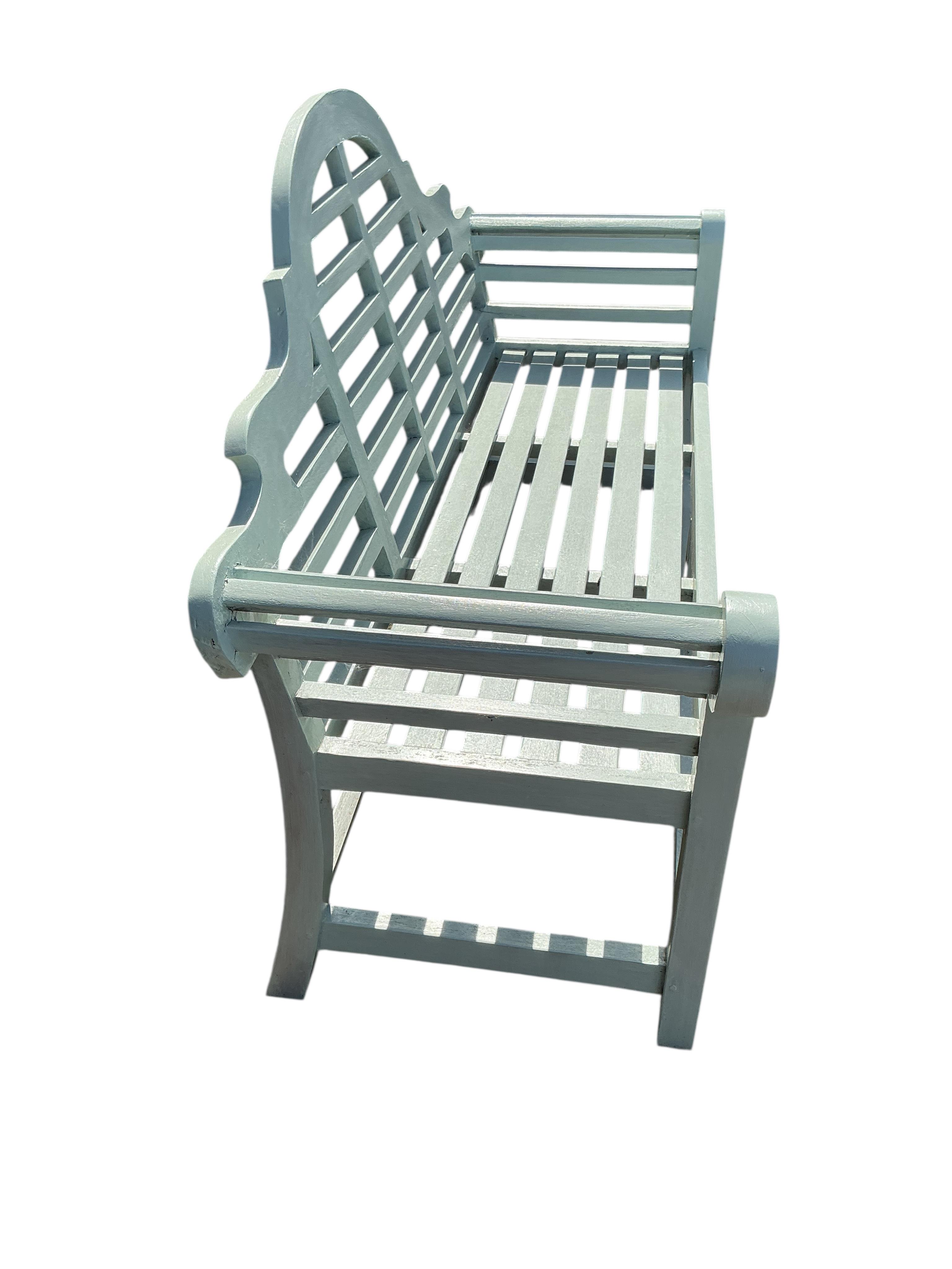 A Lutyens style teak garden bench, later painted, width 168cm, depth 52cm, height 105cm